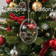 Crystal Christmas ornament with Santa and reindeer sleigh design and engraved "Merry Christmas", lettering, and year, on a green background, labeled 'Traditional Edition'.